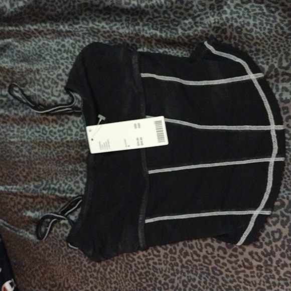 Urban Outfitters Tops - Urban outfitters black cami size small NWT